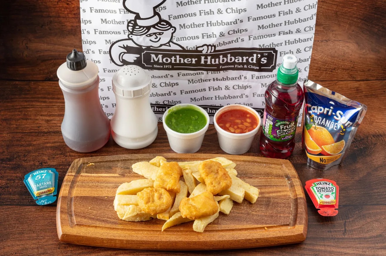 A children’s meal of chicken nuggets and chips with mushy peas, beans, a Capri-Sun and a Fruit Shoot