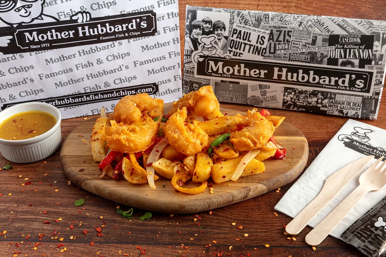 Salt and pepper prawns with peppers on a wooden board