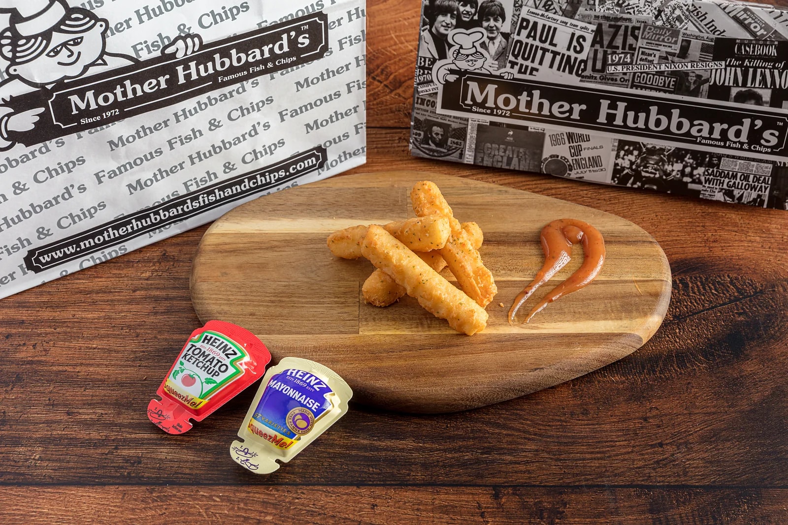 Halloumi sticks on a board with a swoosh of ketchup