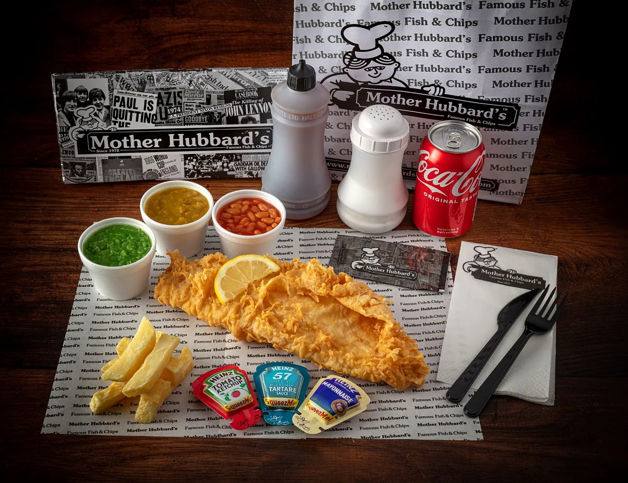 Regular fish and chips with sauces and a drink